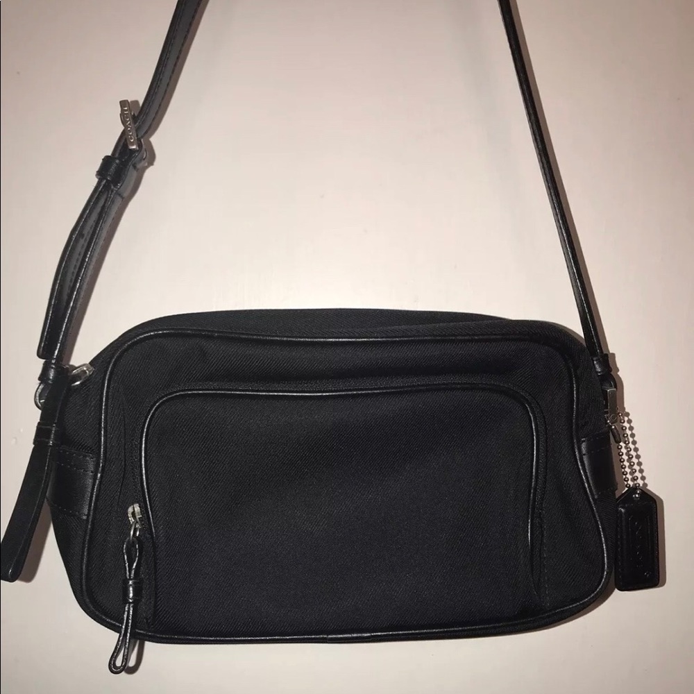 Coach leather trimmed handbag.